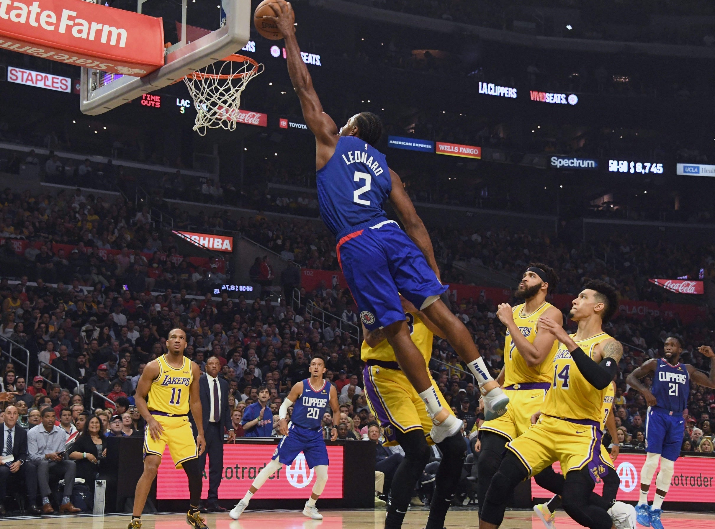 adrian wojnarowski kawhi leonard