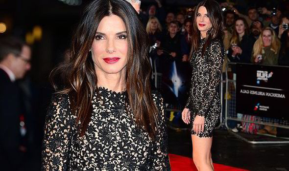 Sandra Bullock Shows Off Her Perfect Pins In Short Dress At