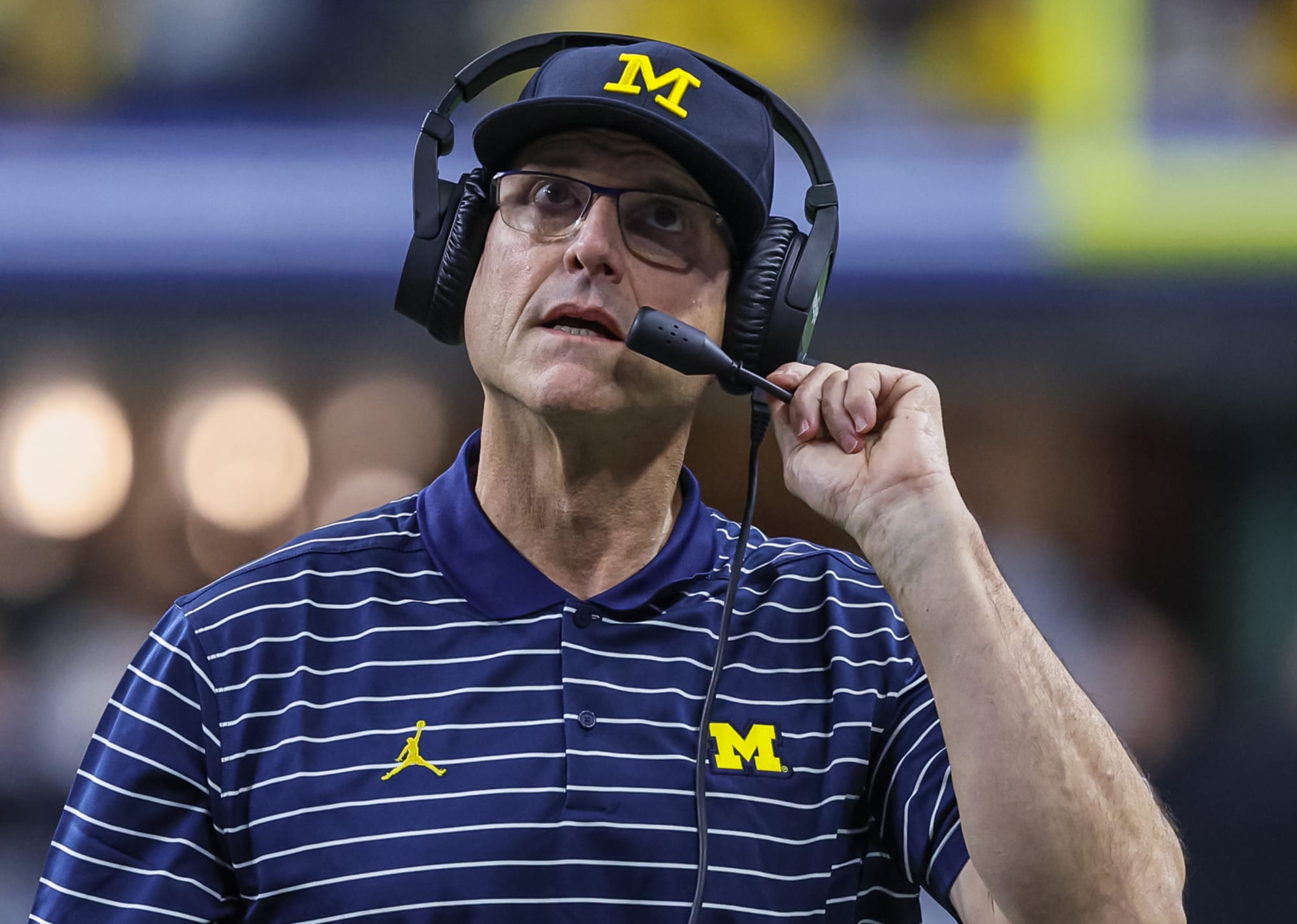 Denver Broncos news: Jim Harbaugh will remain at Michigan