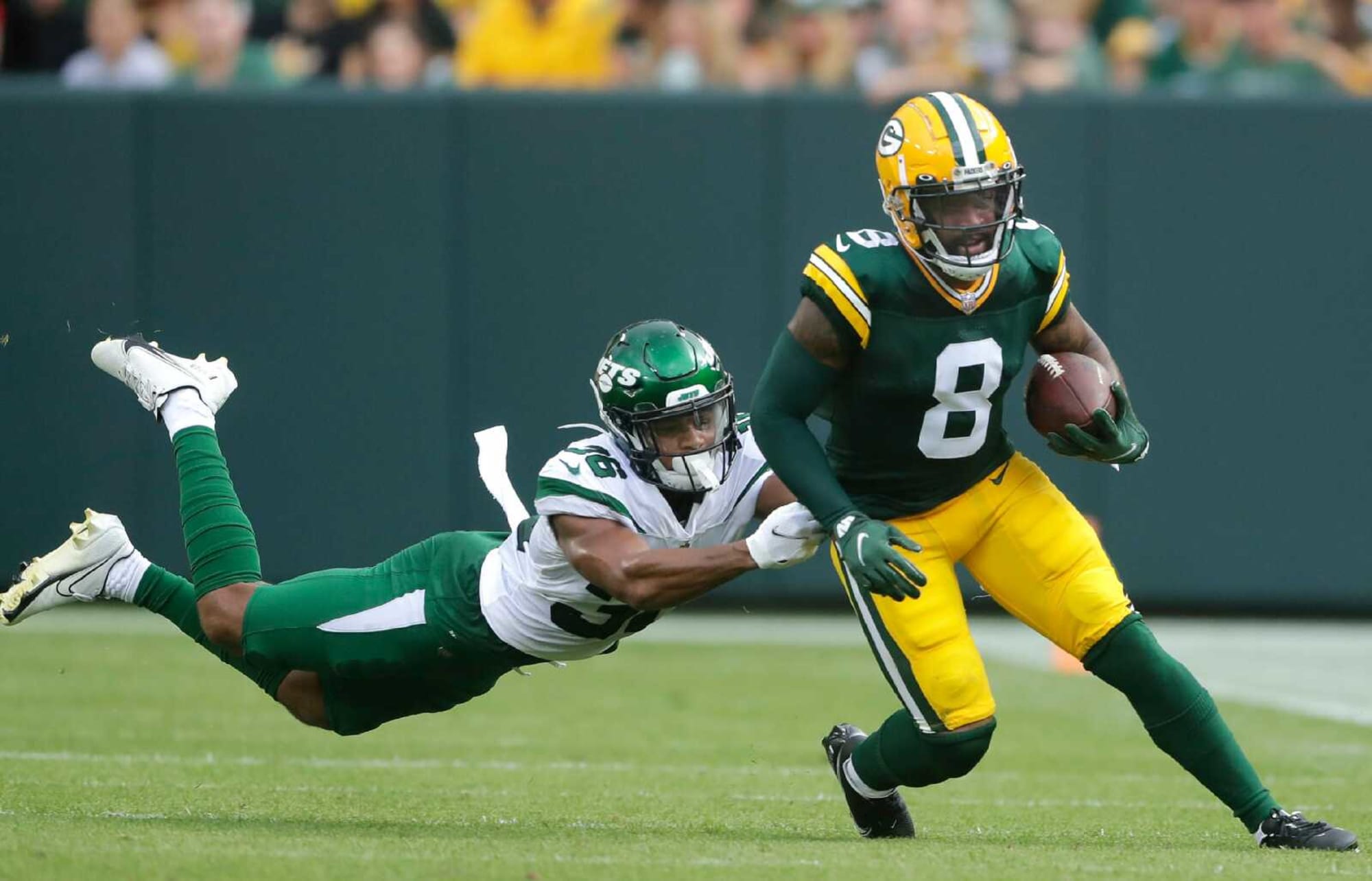 Amari Rodgers makes a run after a catch in a preseason game against the New York Jets