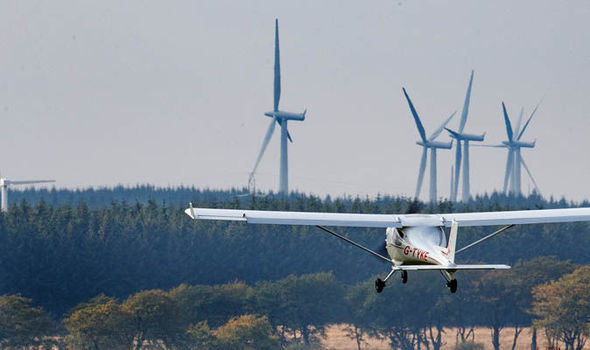 Image result for image of wind turbines and small planes