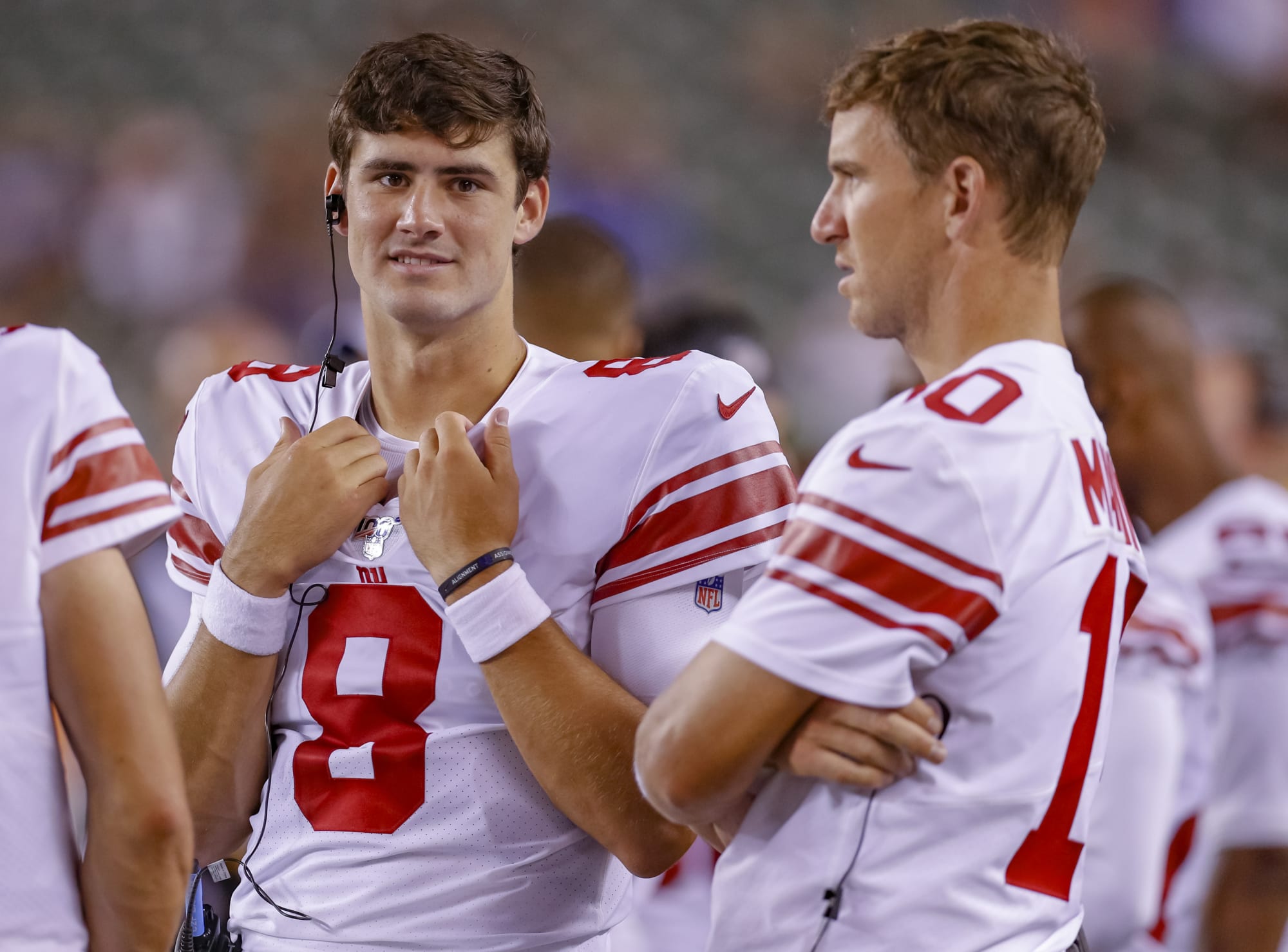 Eli Manning and Daniel Jones help with Girls Flag Football clinic