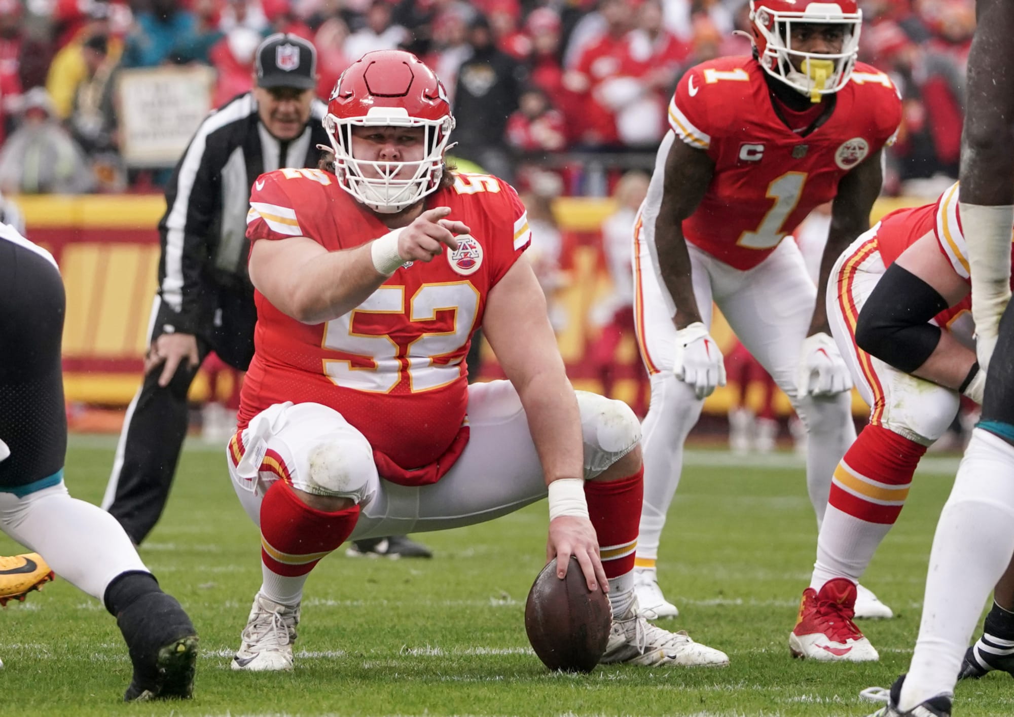 Kansas City Chiefs center Creed Humphrey (52) walks the sideline