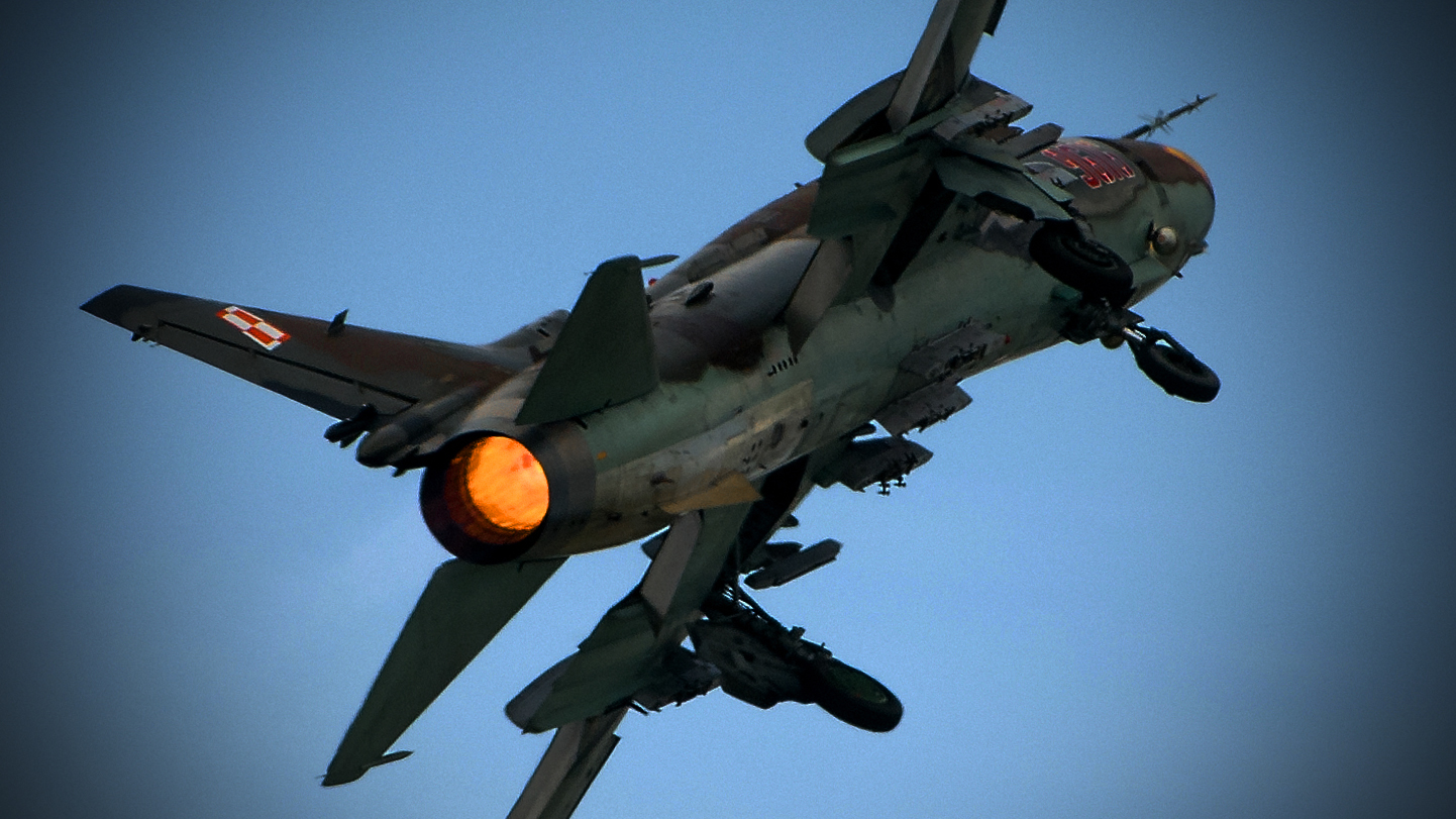 Polish Su-22 Drops Photo Flash Flares In Rare Nighttime Display Polish Su-22 Drops Photo Flash Flares In Rare Nighttime Display